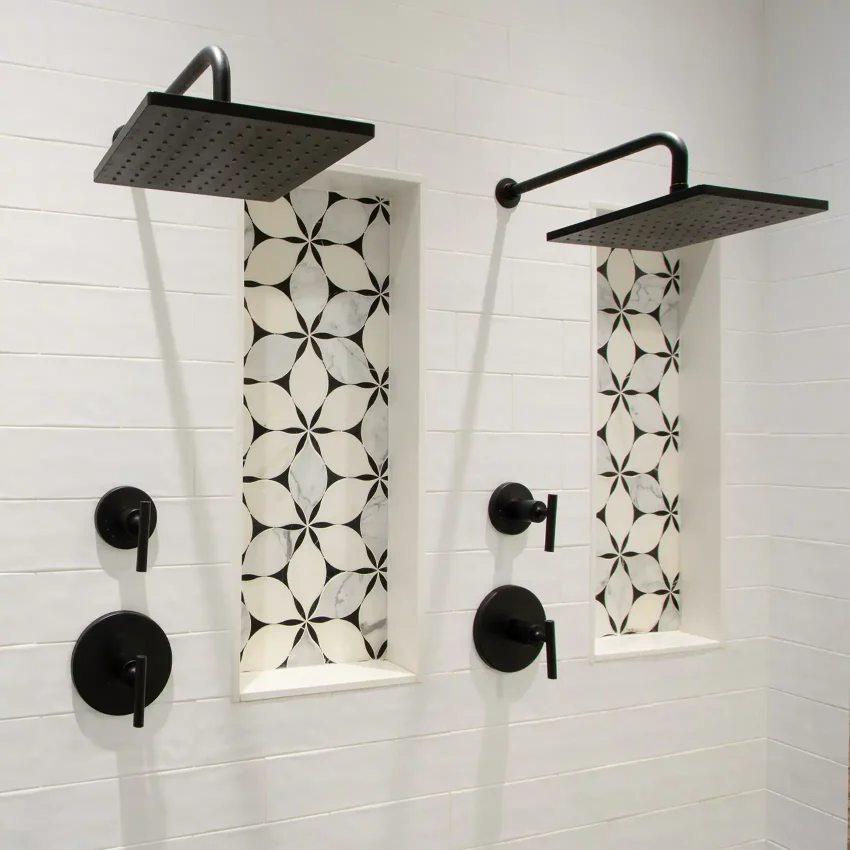 Bathroom with a matte black dual rainfall shower and geometric tile