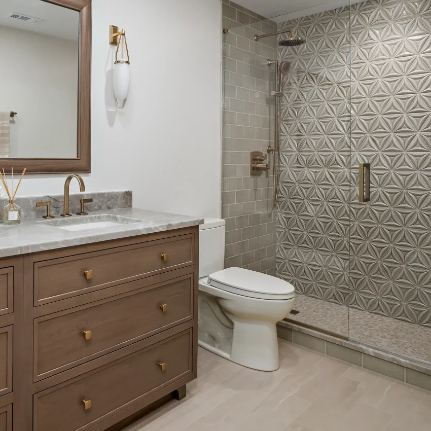 Bathroom with a walnut vanity, geometric tile and brass shower fixtures