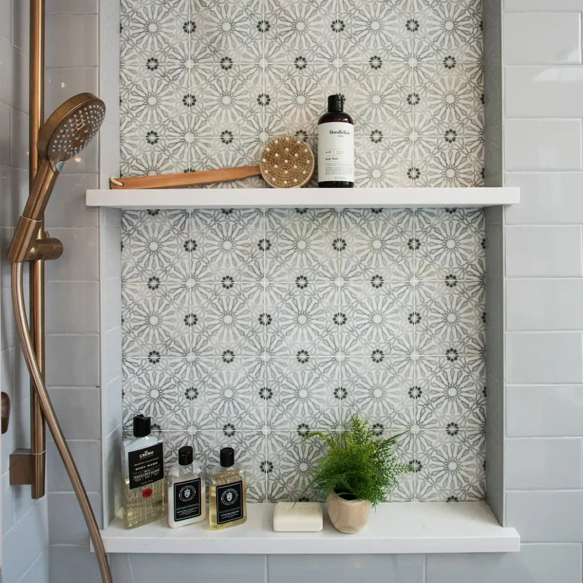 Bathroom with white subway tile and a floating shelf